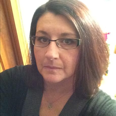 Woman wearing glasses with a blurred background
